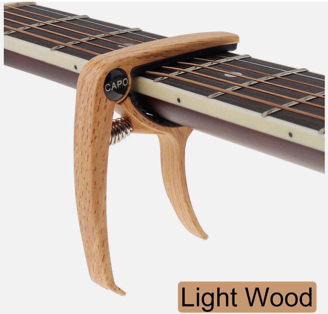 Acoustic Guitar Capo With Built In Pick Holder